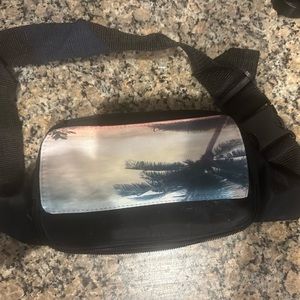 Fanny pack with beach scene. NWOT. Fits waist up to 36”.